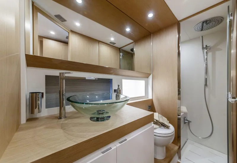 Slide: The Image of Modern bathroom in 2024 Solaris Power 48 OPEN yacht with glass sink and shower. - 15