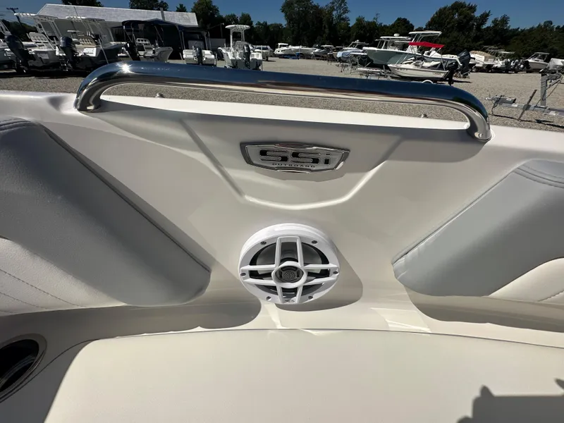 Slide: The Image of 2024 Chaparral 21 SSi OB boat interior with speaker and logo. - 9