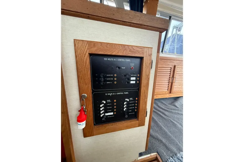 Slide: The Image of Electrical control panel on 1986 Silverton 34 Convertible boat interior. - 18