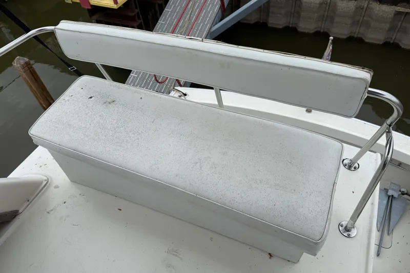Slide: The Image of White bench seat on 1986 Silverton 34 Convertible boat deck. - 9
