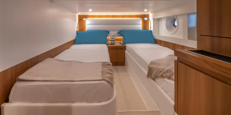 Slide: The Image of Interior cabin of 2024 Solaris Power 48 Lobster yacht with twin beds. - 10