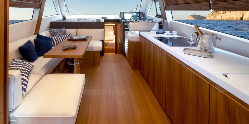 Slide: The Image of Interior of 2024 Solaris Power 48 Lobster yacht with modern wooden finishes. - 8