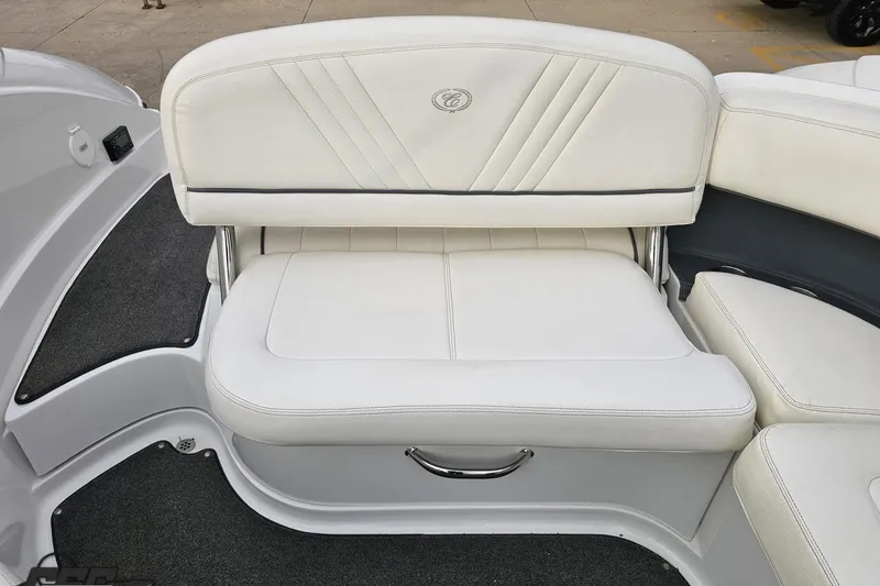 Slide: The Image of White leather seating on a 2007 Cobalt 252 boat, featuring elegant stitching. - 102