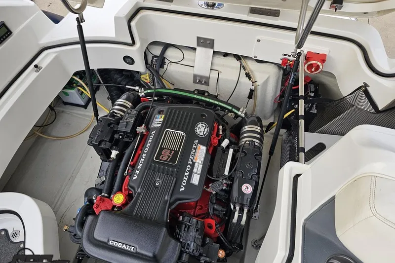 Slide: The Image of 2007 Cobalt 252 boat engine compartment with Volvo Penta 8.1 engine. - 111