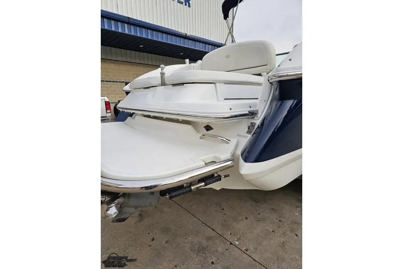Slide: The Image of 2007 Cobalt 252 boat rear view with swim platform and seating. - 34
