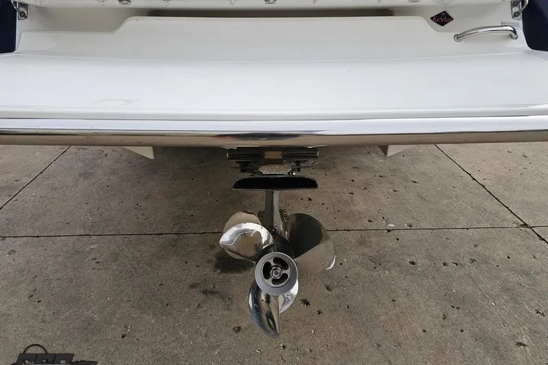 Slide: The Image of Rear view of a 2007 Cobalt 252 boat with a stainless steel propeller. - 37