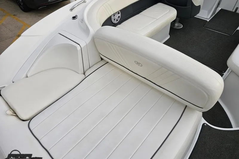 Slide: The Image of 2007 Cobalt 252 boat interior with white leather seating and modern design. - 50