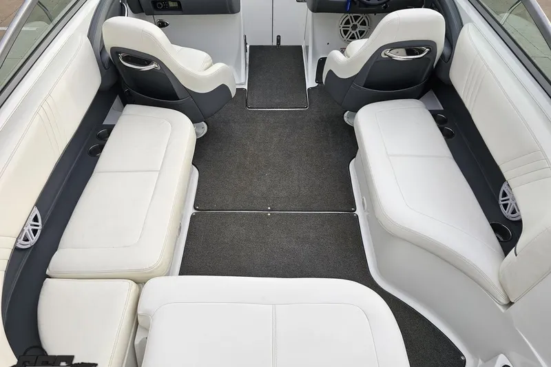 Slide: The Image of Interior of a 2007 Cobalt 252 boat with white seating and gray carpet. - 55