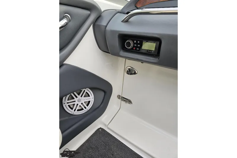 Slide: The Image of 2007 Cobalt 252 boat interior with JL Audio speaker and control panel. - 73
