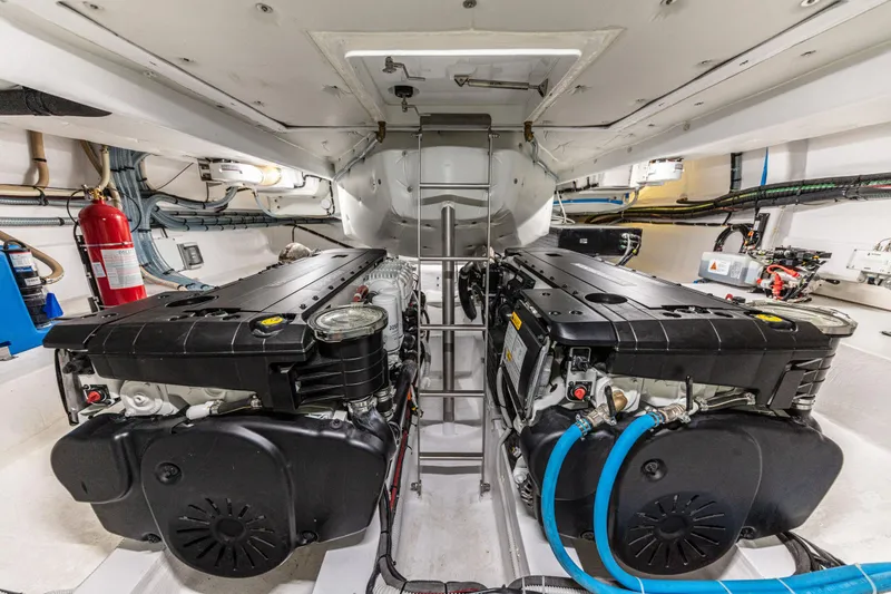 Slide: The Image of Engine room of 2024 Solaris Power 48 Flybridge yacht with twin engines. - 12