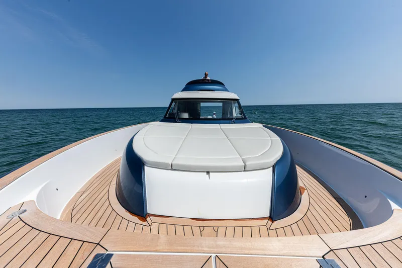 Slide: The Image of 2024 Solaris Power 48 Flybridge yacht on open water. - 8