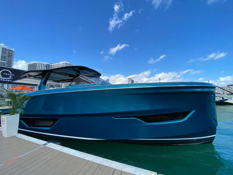 Slide: The Image of 2024 Solaris Power 52 Open luxury yacht docked at marina. - 10
