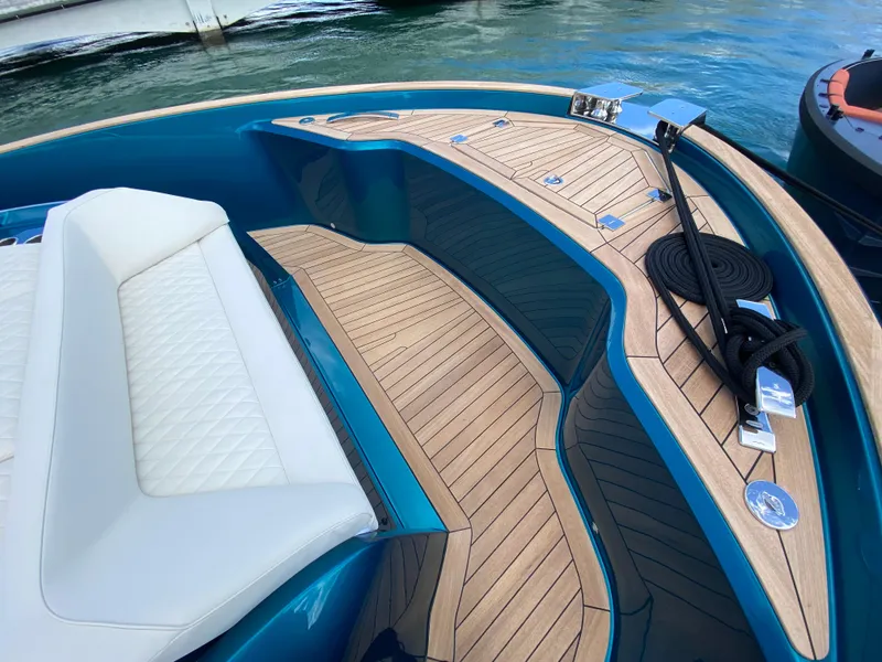 Slide: The Image of 2024 Solaris Power 52 Open boat with teak deck and white seating. - 4