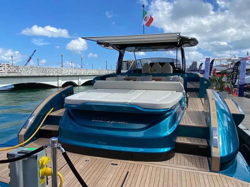 Slide: The Image of 2024 Solaris Power 52 Open luxury yacht docked at marina. - 7