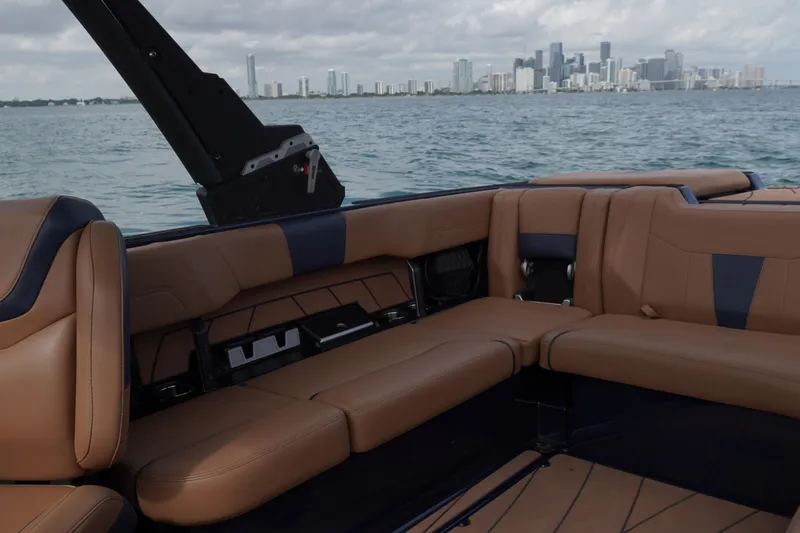 Slide: The Image of 2023 Malibu Wakesetter 23 LSV interior with city skyline in background. - 4