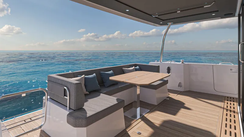 Slide: The Image of 2025 Beneteau Swift Trawler 54 deck with ocean view and seating area. - 9