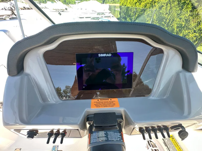 Slide: The Image of Dashboard of 2024 Chaparral 21 SSi OB boat with Simrad display. - 24