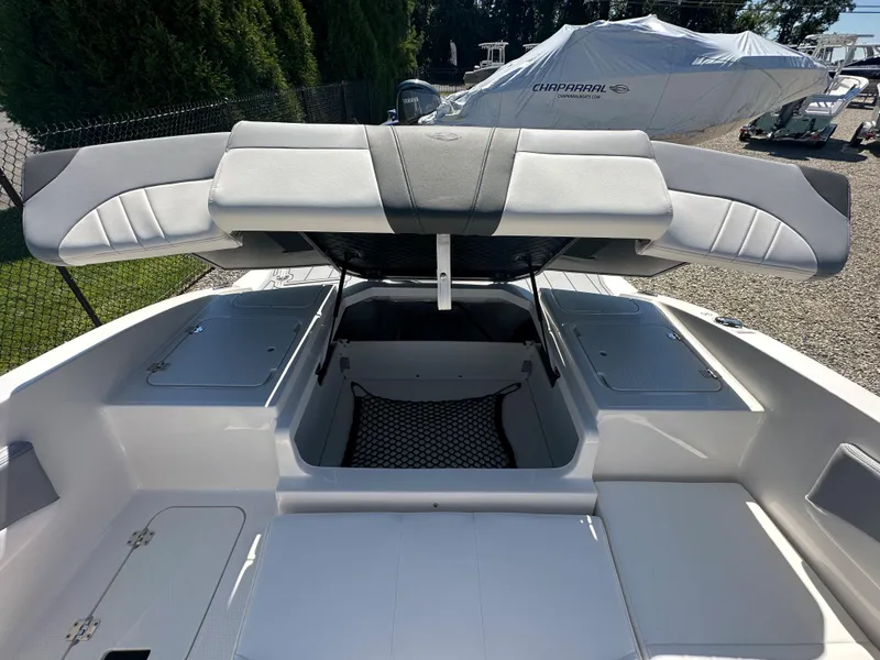 Slide: The Image of 2024 Chaparral 21 SSi OB boat interior with open storage compartments. - 34