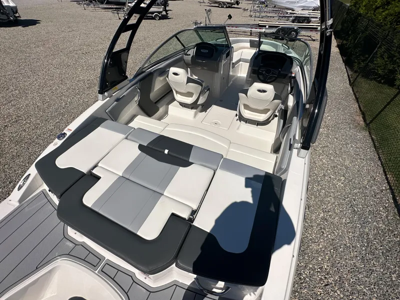 Slide: The Image of 2024 Chaparral 21 SSi OB boat interior with seating and steering console. - 43