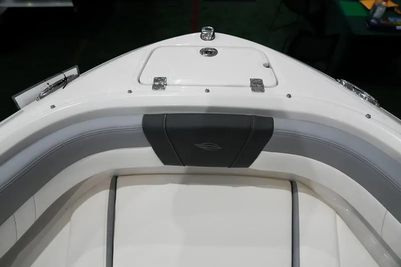 Slide: The Image of 2025 Chaparral 21 SSi boat interior with white and gray seating. - 10