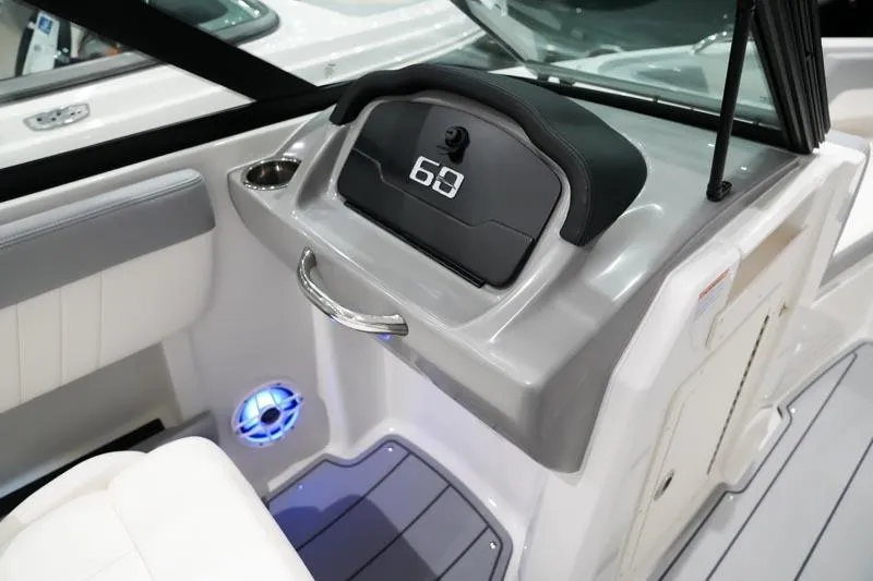 Slide: The Image of Interior of 2025 Chaparral 21 SSi boat, featuring sleek dashboard and modern design elements. - 6