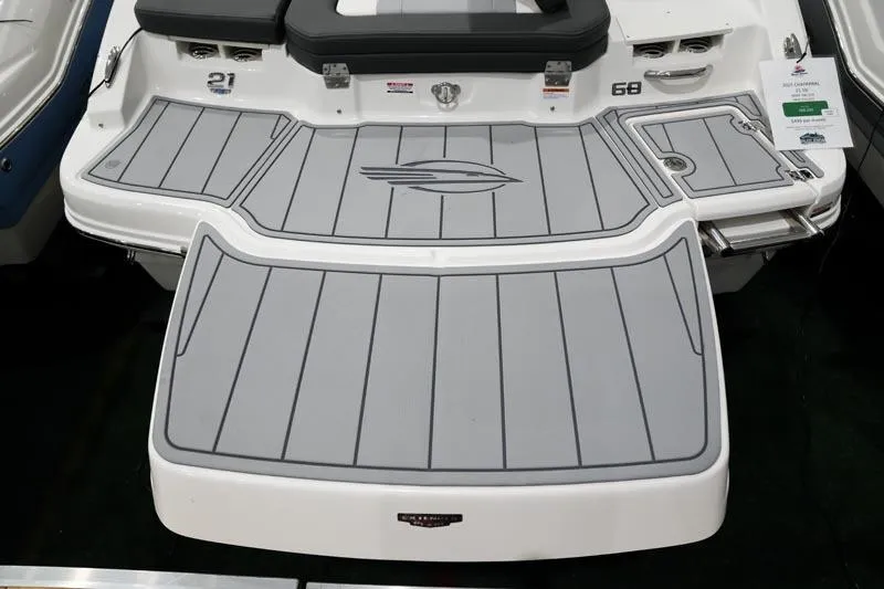 Slide: The Image of 2025 Chaparral 21 SSi boat with sleek gray deck and modern design. - 7