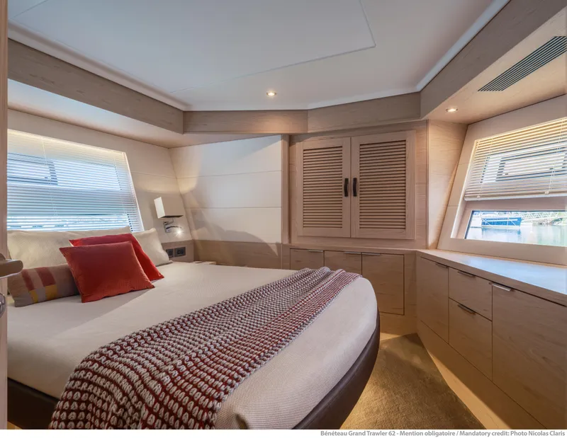 Slide: The Image of Luxurious bedroom in 2025 Beneteau Grand Trawler 62 yacht with modern decor. - 21