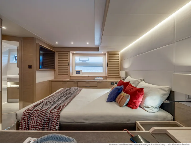 Slide: The Image of Luxurious bedroom interior of 2025 Beneteau Grand Trawler 62 yacht with modern design. - 24