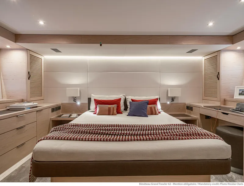 Slide: The Image of Luxurious bedroom in 2025 Beneteau Grand Trawler 62 yacht, featuring modern design and cozy decor. - 25