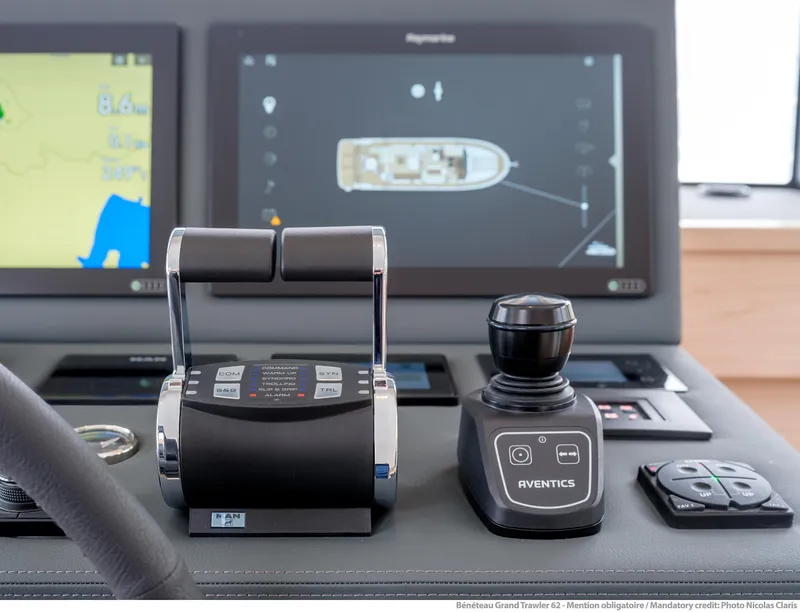 Slide: The Image of Control panel of 2025 Beneteau Grand Trawler 62 with advanced navigation displays. - 36