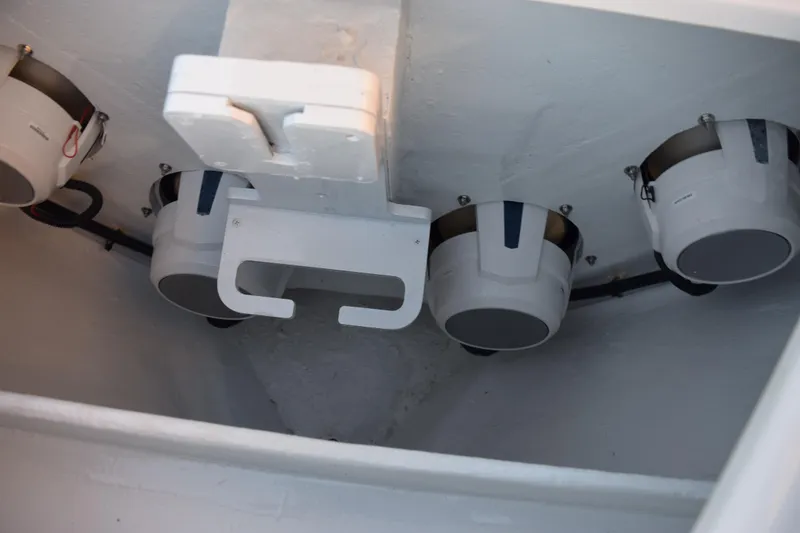 Slide: The Image of 2026 Contender 32 ST boat interior with mounted equipment and wiring. - 19