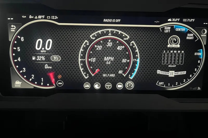 Slide: The Image of Dashboard of a 2023 Malibu M240 boat displaying speed, RPM, and ballast settings. - 31