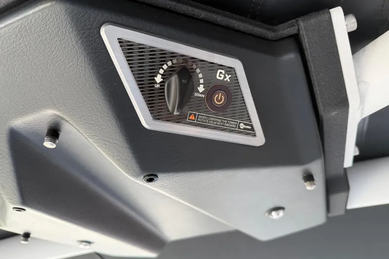Slide: The Image of Control panel of 2023 Malibu M240 boat, featuring Gx tower adjustment. - 35