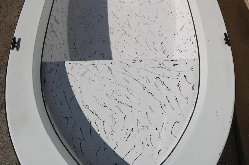 Slide: The Image of 2018 Mr. B's Boats 16 Skiff interior with speckled white design. - 10