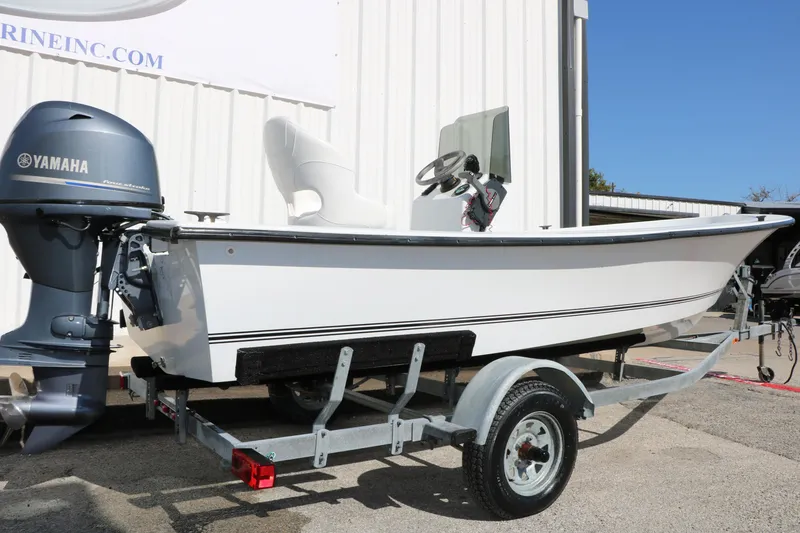 Slide: The Image of 2018 Mr. B's Boats 16 Skiff on trailer with Yamaha outboard motor. - 3