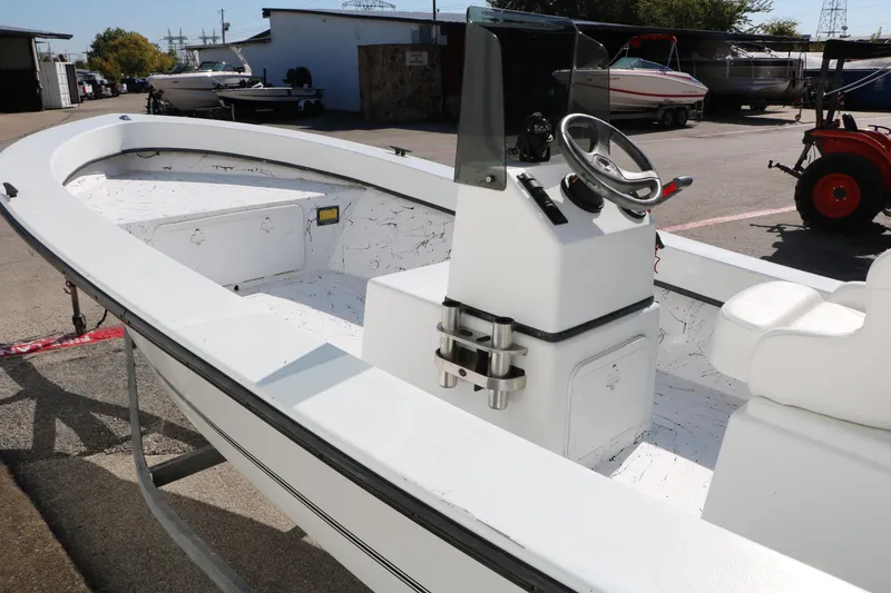 Slide: The Image of 2018 Mr. B's Boats 16 Skiff, white interior, steering console, outdoor display. - 6