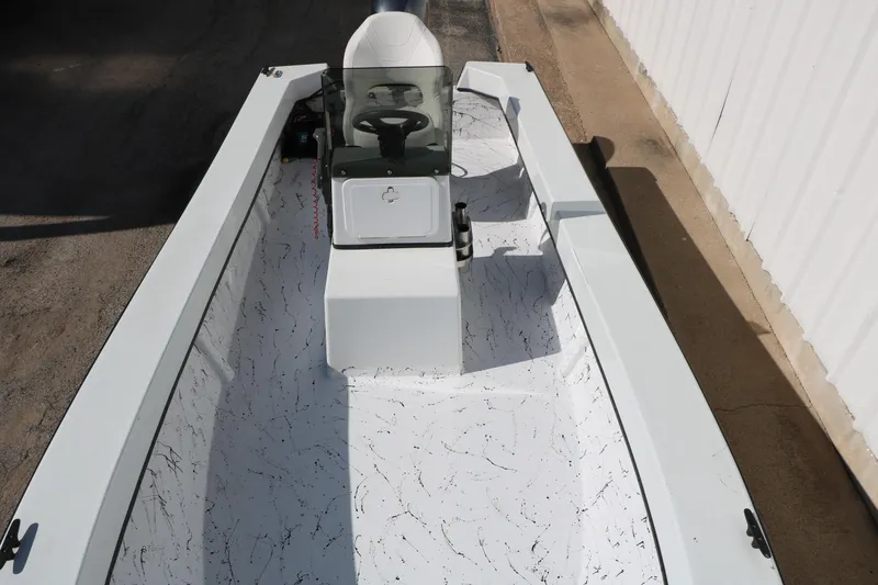 Slide: The Image of 2018 Mr. B's Boats 16 Skiff with white interior and central console. - 9