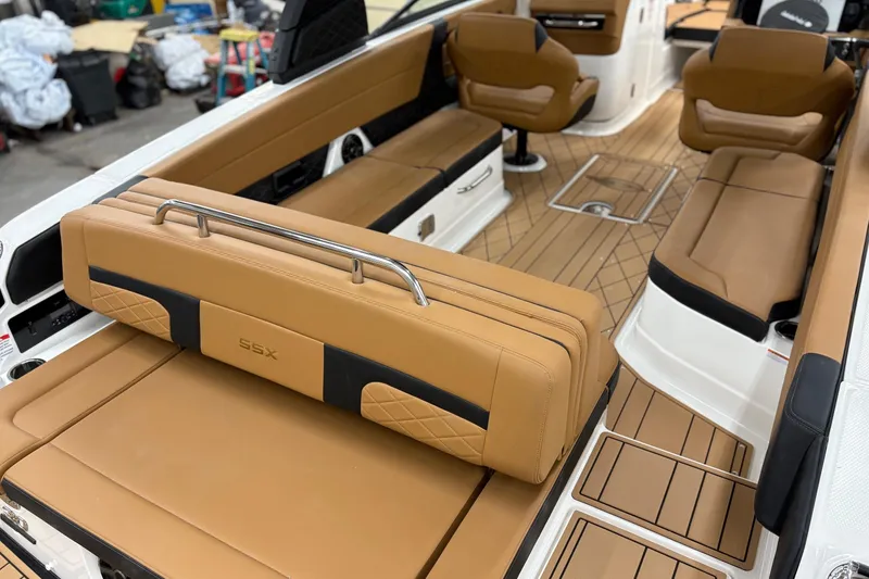Slide: The Image of Luxurious interior of 2026 Chaparral 30 SSX boat with tan leather seating. - 6