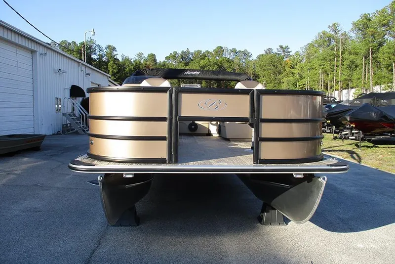 Slide: The Image of 2026 Bentley Pontoons Fish 200 4-Point pontoon boat at a dealership. - 2