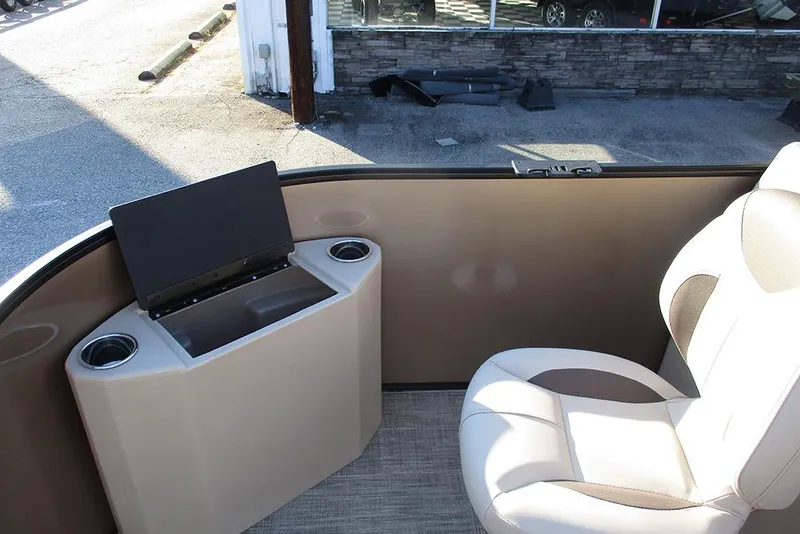 Slide: The Image of 2026 Bentley Pontoons Fish 200 4-Point interior with seating and storage console. - 8