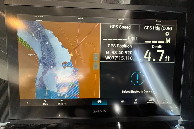 Slide: The Image of Garmin navigation display on 2023 Beneteau Antares 11, showing map and depth of 4.7 feet. - 25