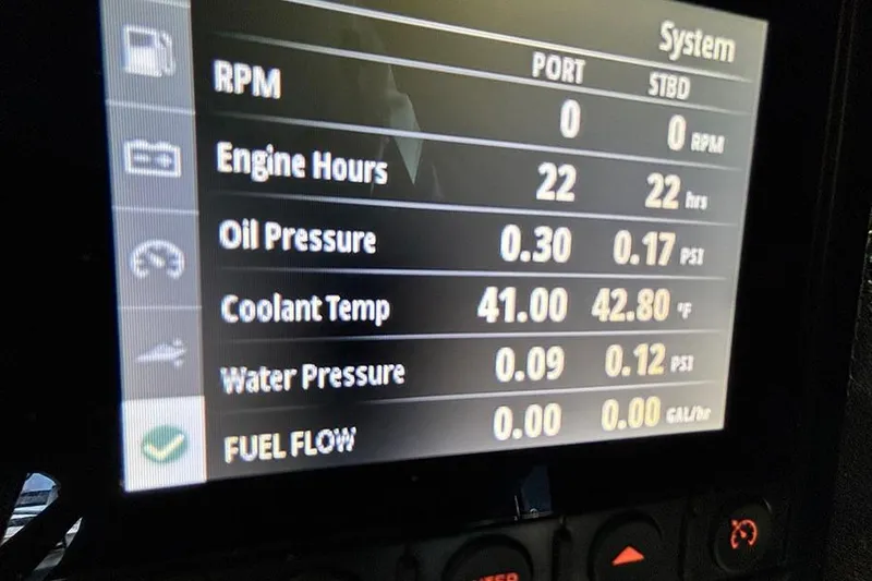 Slide: The Image of Display screen of 2023 Beneteau Antares 11 showing engine metrics and system status. - 26