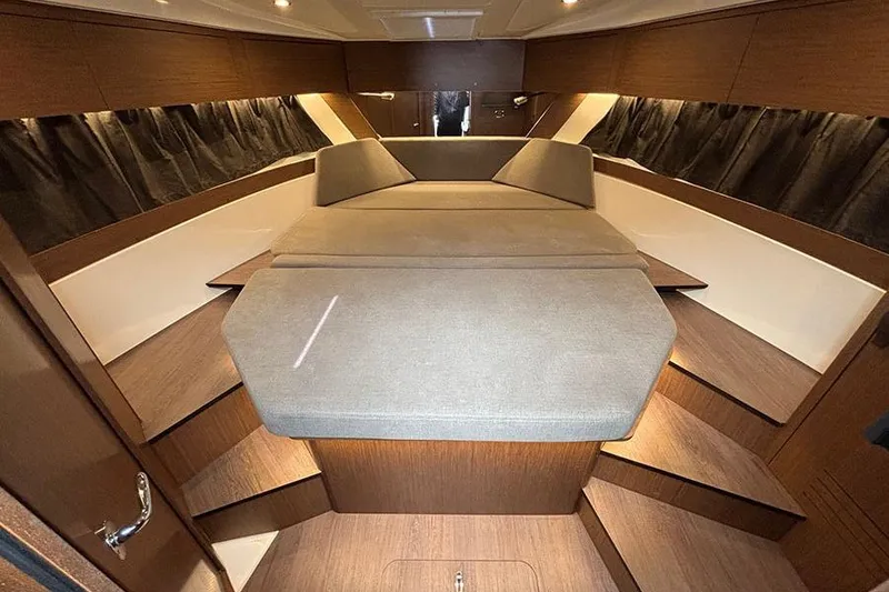 Slide: The Image of Luxurious interior cabin of 2023 Beneteau Antares 11 with elegant wood finish. - 31