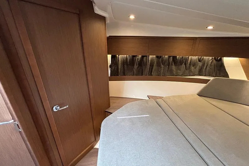 Slide: The Image of Luxurious interior of 2023 Beneteau Antares 11 yacht with elegant wood finish. - 33