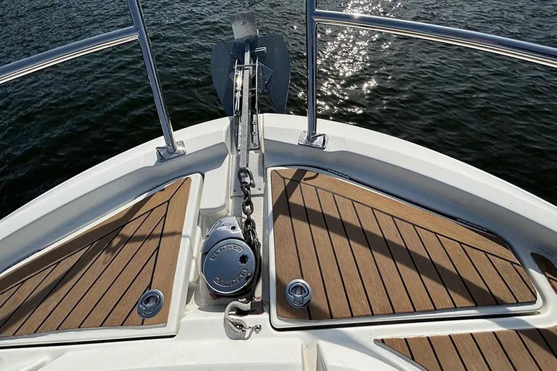 Slide: The Image of Bow of 2023 Beneteau Antares 11 with anchor and teak decking. - 4