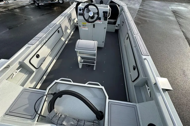 Slide: The Image of 2026 Weldcraft 200 Rebel Open CC boat interior with console and seating. - 5