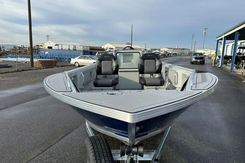 Slide: The Image of 2026 Weldcraft 200 Rebel Open CC boat on trailer, featuring dual seats and sleek design. - 3