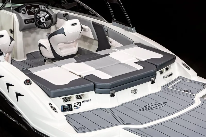 Slide: The Image of Manufacturer Provided Image: 2025 Chaparral 21 SSi boat interior with sleek seating and modern dashboard design. - 23