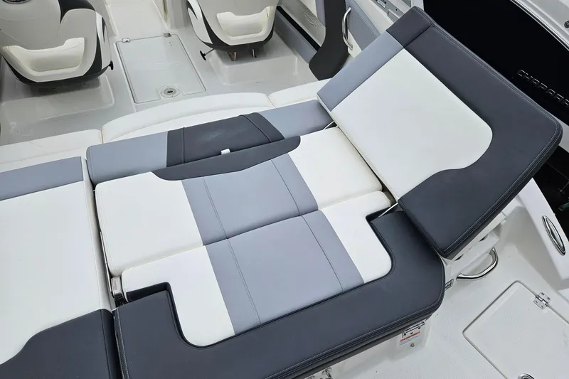 Slide: The Image of 2025 Chaparral 21 SSi boat interior with adjustable seating and modern design. - 7