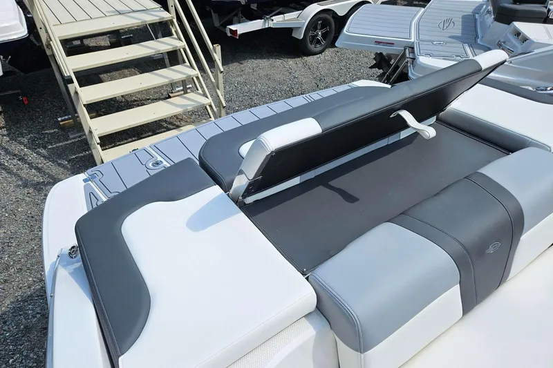 Slide: The Image of 2025 Chaparral 23 SSi boat interior with sleek seating and modern design. - 10